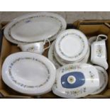 A Royal Doulton Pastorale pattern six-setting dinner service, comprising an oval meat plate,
