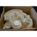 A Meakin six-setting tea service, printed with English country flowers on an oat ground,