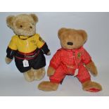 A novelty bear, wearing a Porsche RS Spyder overall; another,