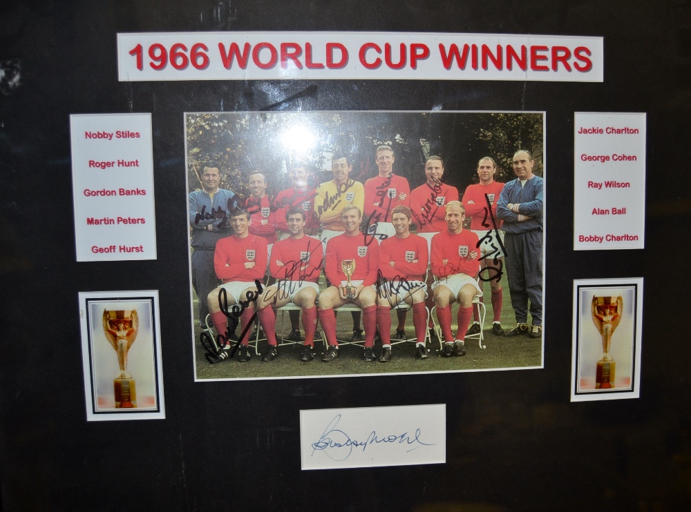 1966 World Cup Winners - a colour photograph, signed by the some of the team including Bobby Moore,
