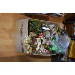 Christmas decorations - holly garlands, baubells; Santa; other tree decorations.