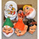 A set of novelty Disney Snow White masks; a 1930s Disney Mickey Mouse tin plate pin dish;