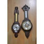 Two banjo wall barometers; an Art Deco wall weather station; another.