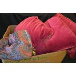 Textiles - tasseled claret ground cushions (3); a pair of mauve velvet-type curtains;