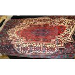 An Iranian carpet, 30" x 38" **All lots in this sale are subject to a maximum of £2.