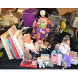 A pedigree black doll; other dolls; doll collecting books,