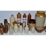 Stoneware - a Pearson storage jar; a brown saltglazed stoneware jelly mould; ginger beer bottles;