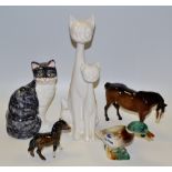 Animal Models - a grey and white cat; a tall sylised pair of white cats;