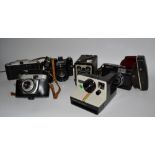 Photography - a Devit camera, an Optima 500 camera, a Kodak Brownie,