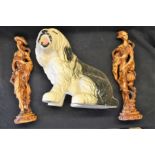 A pair of resin Chinese style figures; a novelty ceramic fireside sheepdog;