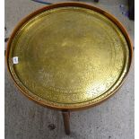 A Middle-Eastern style brass folding table **All lots in this sale are subject to a maximum of £2.