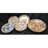 Oriental Ceramics - an 18th century Chinese Imari plate; a Japanese Imari fluted charger,