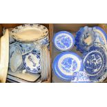 A Victorian Staffordshire blue and white meat plate; a set of Willow pattern dinner plates;