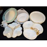 A Continental hors d'oeuvre dish; another; serving plates;