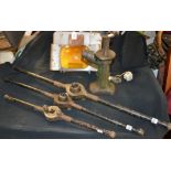 An Arthur Wragg cast metal light fitting; three large tap-and-dies;