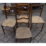 Four various early 20th century chairs. Ladder backed, rush seated.