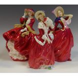 Royal Doulton figures including Autumn Breezes HN1934; Top O' The Hill HN1834;