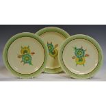 A pair of Clarice Cliff Pansy pattern side plates, 19cm diameter, another dessert plate similar, 21.