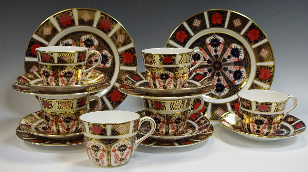 A Royal Crown Derby 1128 tea service, six cups, five saucers, four side plates,