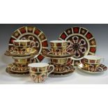 A Royal Crown Derby 1128 tea service, six cups, five saucers, four side plates,