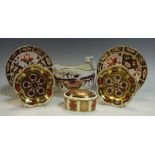 A Royal Crown Derby 1128 pattern oval trinket box and cover; two similar petal shaped dishes;