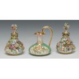 A pair of English Porcelain scent bottles, probably Spode, encrusted with colourful flowers,