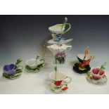 Franz Porcelain Collection - various teacups & saucers and conforming spoons including Poppy, Peony,
