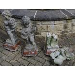 Garden Statutory - a near pair of reconstituted composite cherubs;