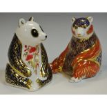 A Royal Crown Derby paperweight, Honey Bear, gold stopper, boxed; another, Panda, gold stopper,