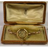 A 1920s lady's 9ct gold wristwatch, octagonal case,