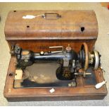 A late 19th/early 20th century manual sewing machine,