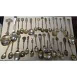 A quantity of silver, white metal and plated spoons, including English, Continental,