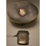 A late 19th/early 20th century oval horn box, white metal cartouche; a silver vesta case,