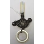 A silver and mother of pearl baby rattle,