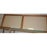 A pair of pine glazed single door wall hanging display cabinets, eleven glass shelves,