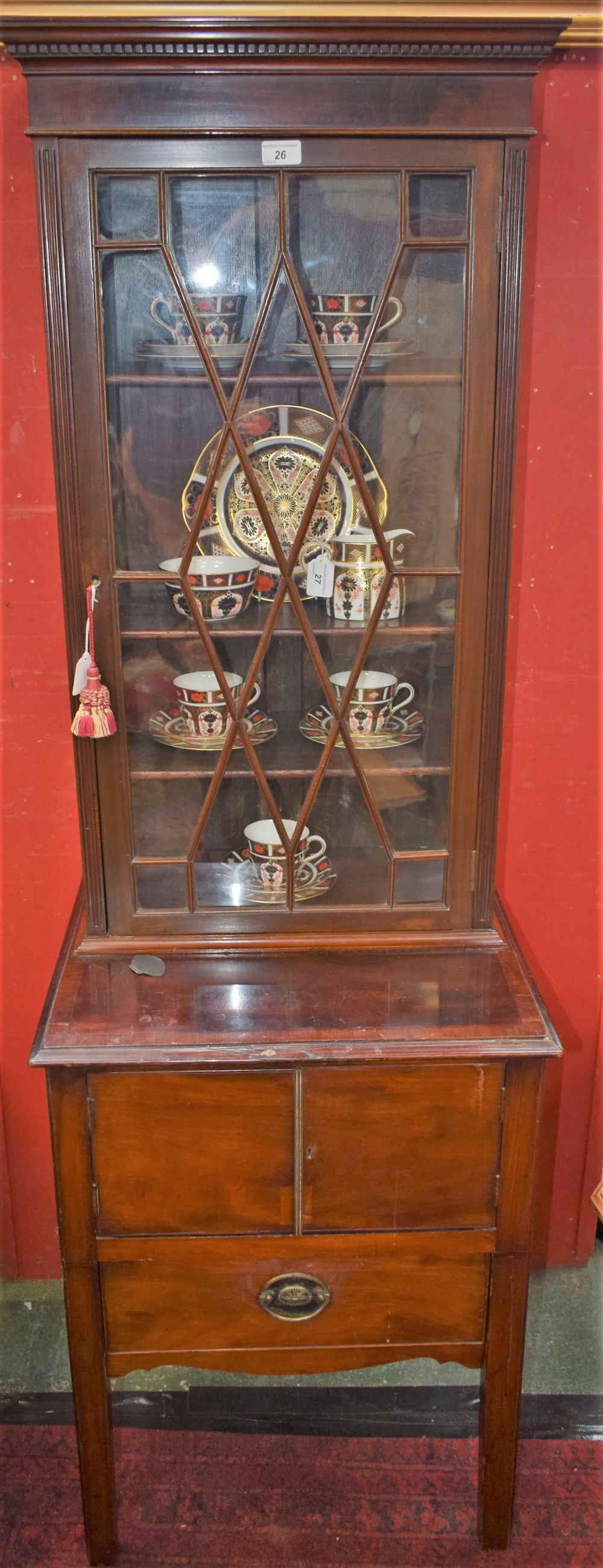 A 'George III' mahogany bookcase, of a small and composed nature,