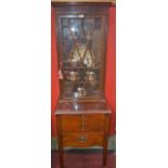 A 'George III' mahogany bookcase, of a small and composed nature,