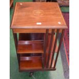 An Edwardian mahogany revolving bookcase,