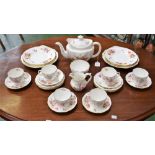 A Royal Crown Derby Posie pattern tea service, for six, comprising tea pot, milk jug, sugar bowl,