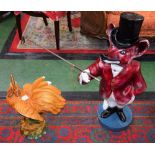 A novelty humorous floor standing model of a Fox Huntsman with top hat holding a riding crop,