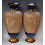 A large pair of Royal Doulton ovoid pedestal vases,