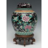 A Chinese famille noire ovoid ginger jar and cover,