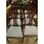A Set of eight Hepplewhite style dining chairs, including two carvers.