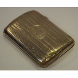 An early 20th century silver cigarette case, cartouche engraved KD to JDS 1913,