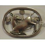 A Georg Jensen sterling silver kneeling deer oval brooch No 256