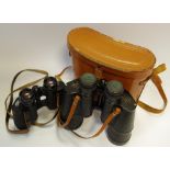 A pair of Zeiss Jenoptem 8 x 30W binoculars; another pair of Greenkat 10 x 50W binoculars,