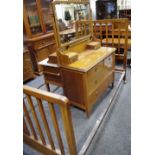 An Edwardian Sheraton revival mahogany dressing chest,