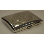 A silver cigarette case,