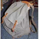 A vintage leather & canvas mountaineering rucksack with metal frame c1950's