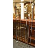 An Arts and Crafts style tubular steel coat stand.